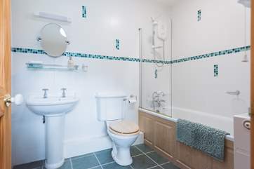 The second bathroom is next door to the twin room.