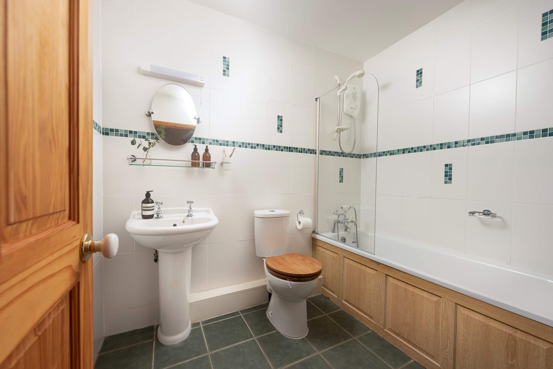 The bathroom is next door to bedroom 1.