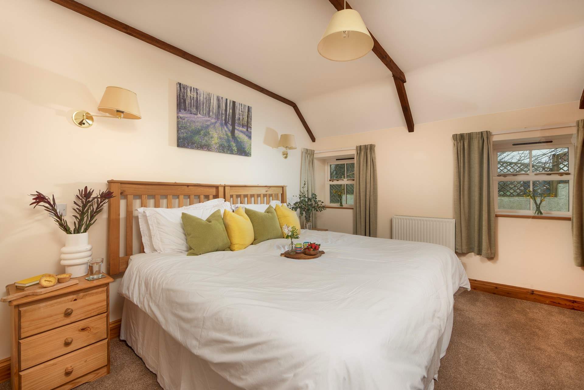 Bedroom 1 is both spacious and cosy. 