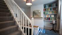 Stairs lead from the snug to the first floor.