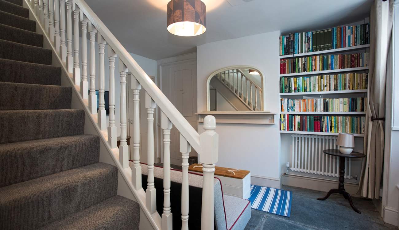 Stairs lead from the snug to the first floor.