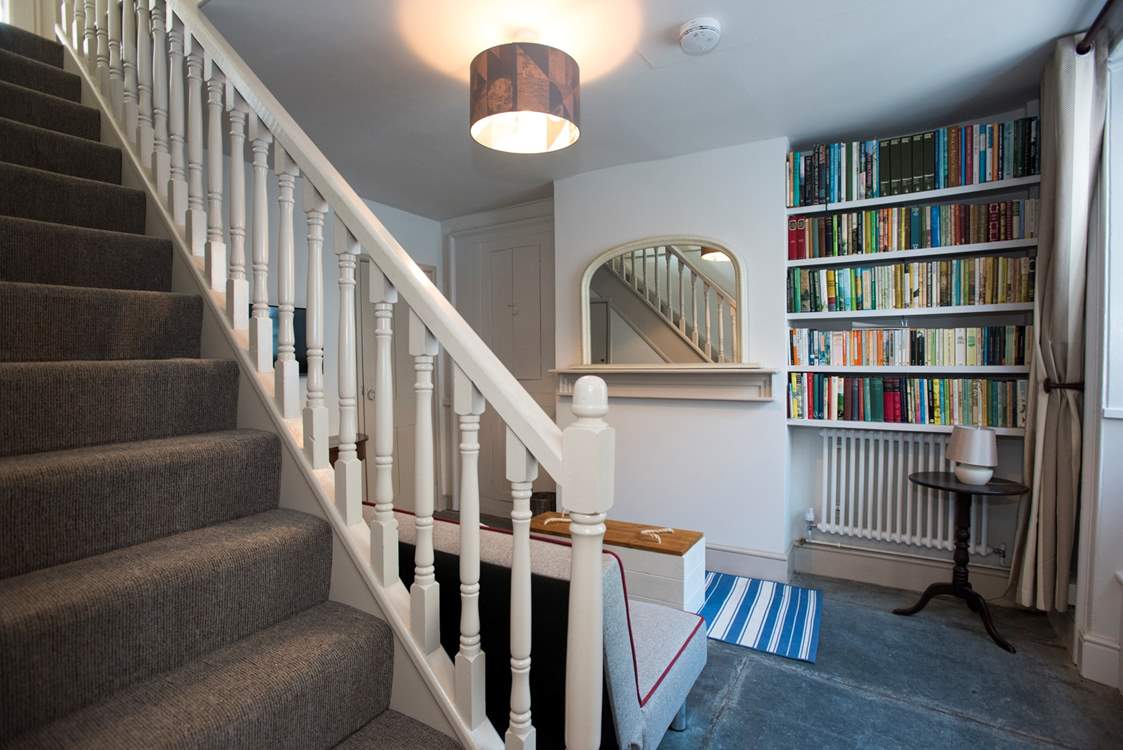 Stairs lead from the snug to the first floor.