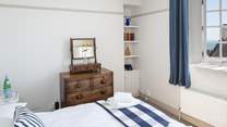 Bedroom 3, one of the two double bedrooms, with some lovely vintage features.