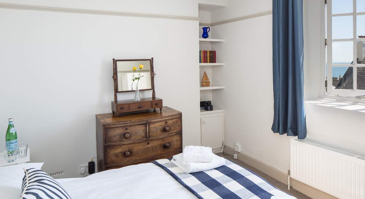 Bedroom 3, one of the two double bedrooms, with some lovely vintage features.