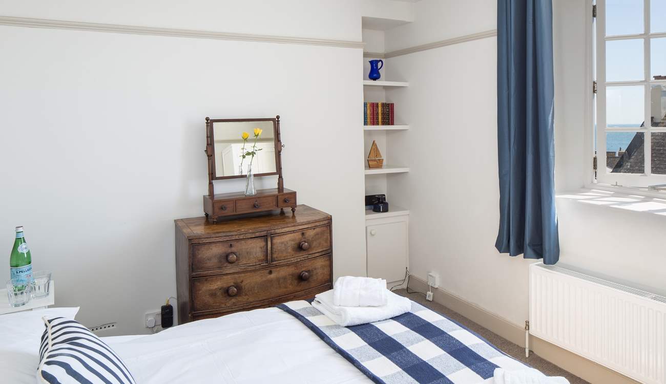 Bedroom 3, one of the two double bedrooms, with some lovely vintage features.