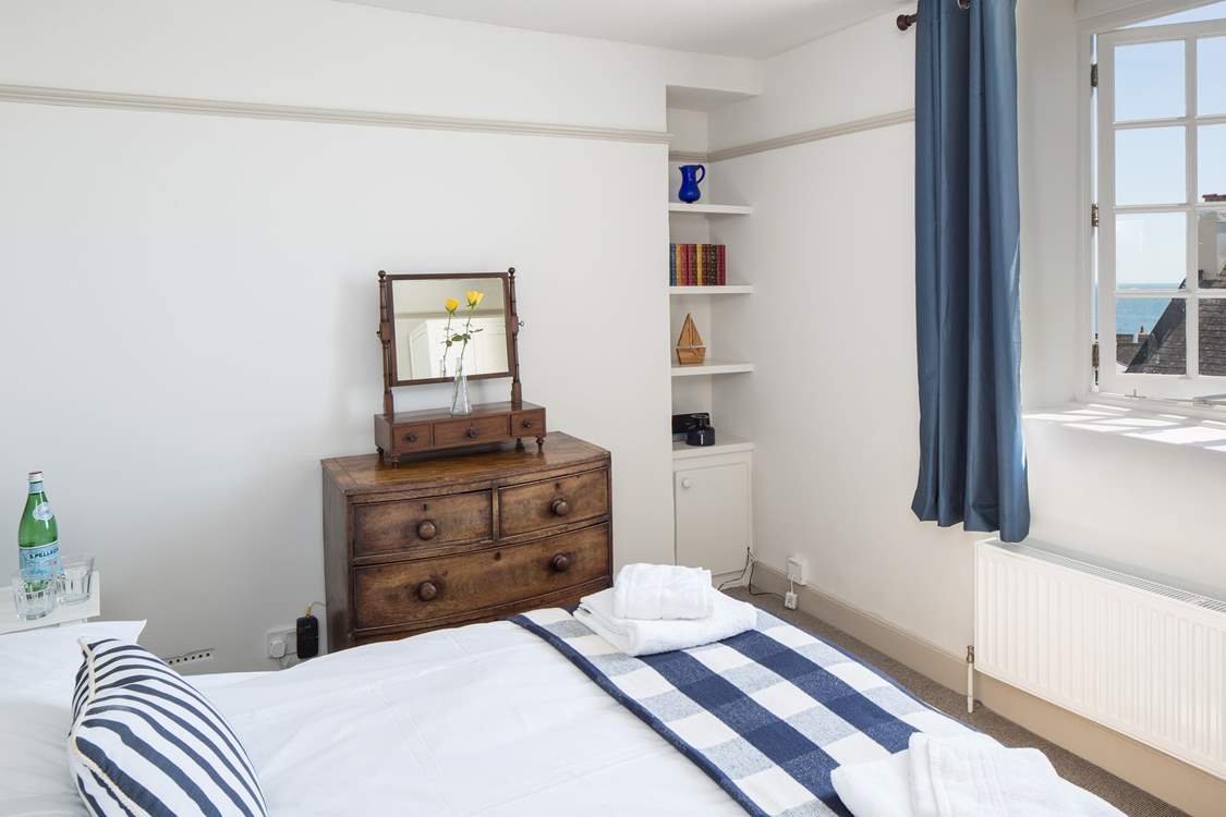Bedroom 3, one of the two double bedrooms, with some lovely vintage features.