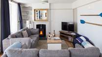 The stylish sitting-room has a Smart TV and BT Vision with sports package and DVD player.