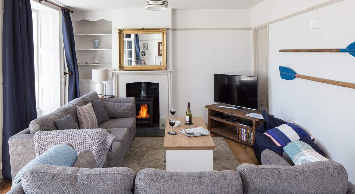 The stylish sitting-room has a Smart TV and BT Vision with sports package and DVD player.