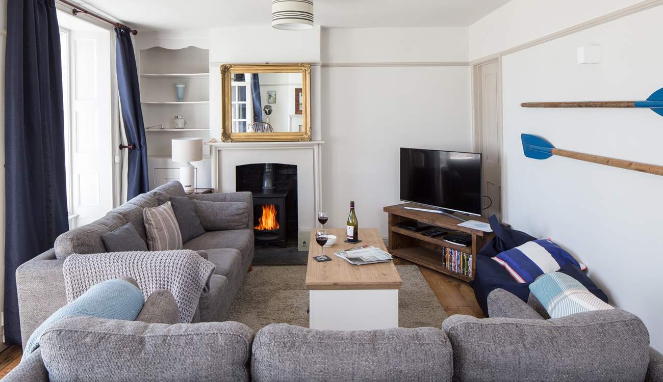 The stylish sitting-room has a Smart TV and BT Vision with sports package and DVD player.