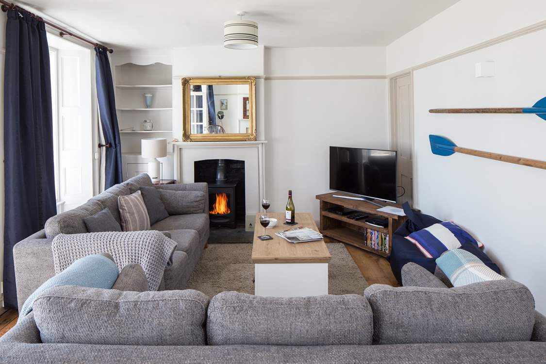 The stylish sitting-room has a Smart TV and BT Vision with sports package and DVD player.