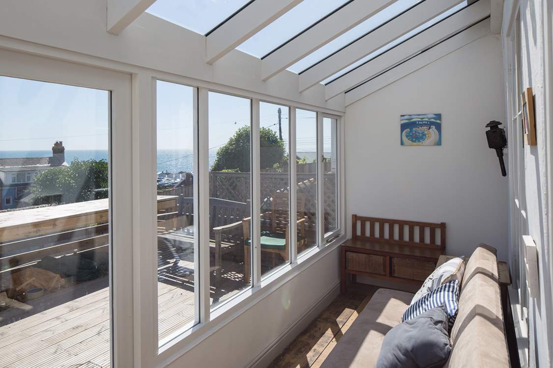 The fully glazed terrace is a great place to watch the changing seascape, whatever the weather.