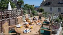 Breakfast on the terrace, what better start to a day with a view across to Lyme Bay and Monmouth beach.