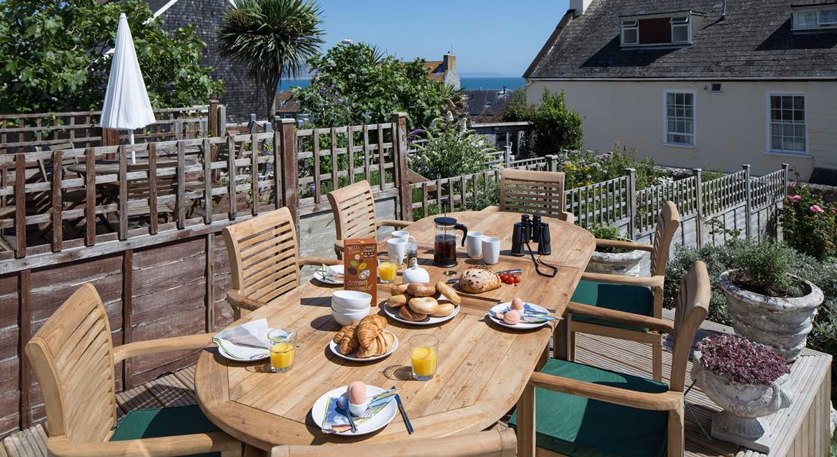 Breakfast on the terrace, what better start to a day with a view across to Lyme Bay and Monmouth beach.