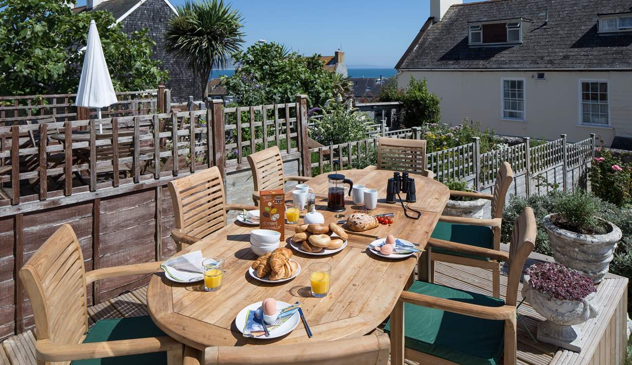 Breakfast on the terrace, what better start to a day with a view across to Lyme Bay and Monmouth beach.