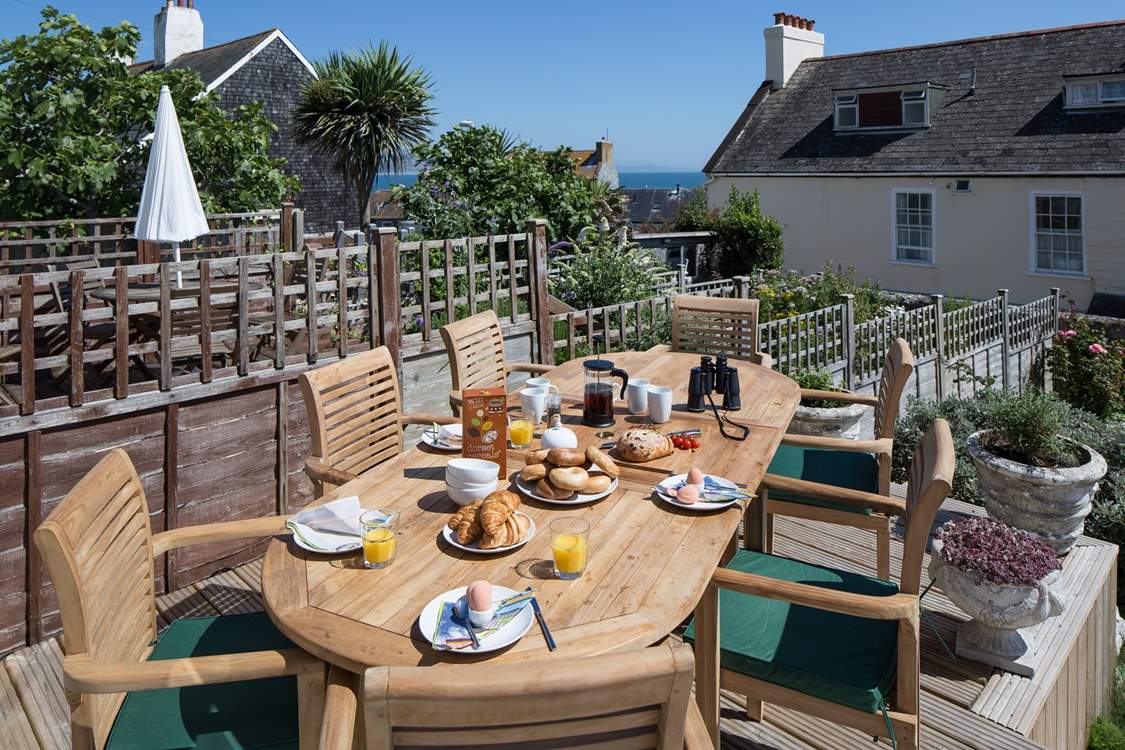 Breakfast on the terrace, what better start to a day with a view across to Lyme Bay and Monmouth beach.