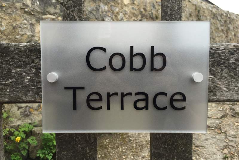 The sign on the gate. Cobb Cottage is through the gate and a short way up the little path on the right.