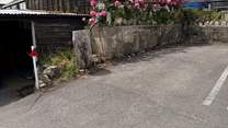 The parking space for Cobb Cottage is located to the back far right of the car park (adjacent to the tree stump). The cottage is just above, accessed via a footpath.