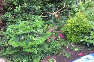 A pretty hand-made dragonfly - you'll see plenty of real ones around the pond too.