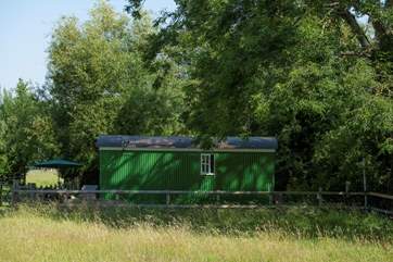 Surrounded by countryside.