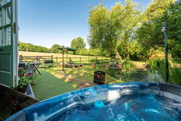 Unwind in the bubbling hot tub and soak in the tranquillity.