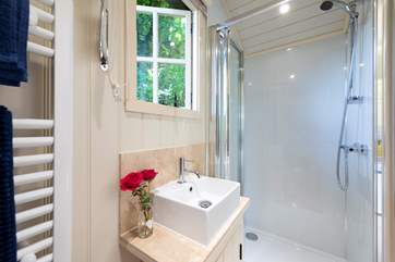 The en suite shower-room is beautifully fitted including a heated towel rail.