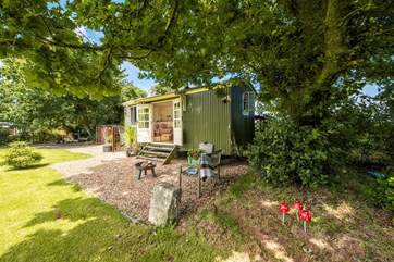 Set in a lovely setting with a lovely old tree for shade.