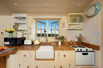The kitchen is extremely well-equipped with a mini-oven and hob, toaster and kettle too.