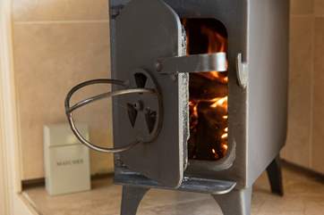 There is a cosy little wood-burner in the corner and under-floor heating too for the cooler months.