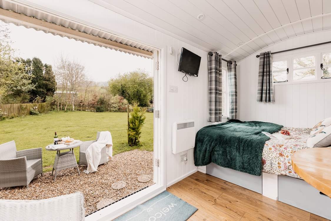 Open up the double doors to allow fresh air to flow through with ease.