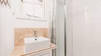 Head through to the sleek shower-room.