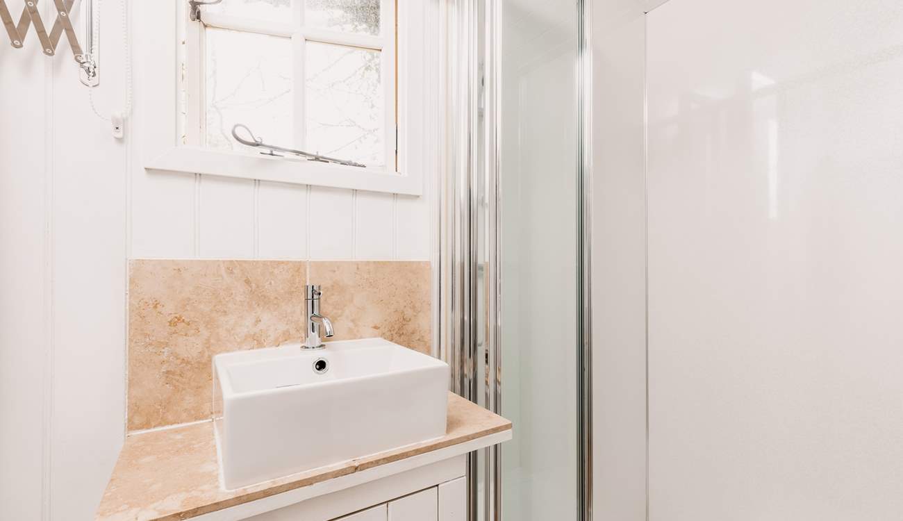 Head through to the sleek shower-room.