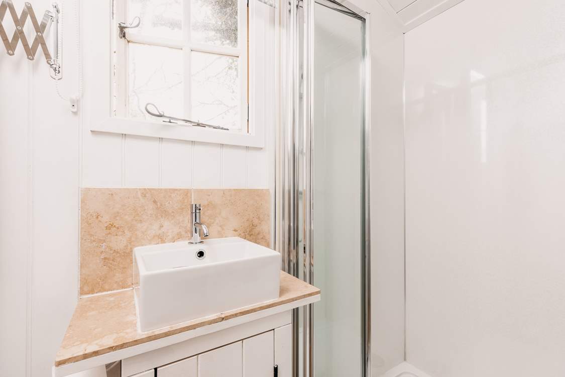 Head through to the sleek shower-room.