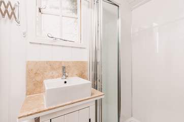 Head through to the sleek shower-room.
