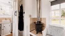 The wood-burner will keep you toasty, no matter the season. 