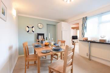 Gather everyone around the dining table to chat about your adventures.