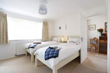 Twin beds in Bedroom 2, ideal for either children or adults.