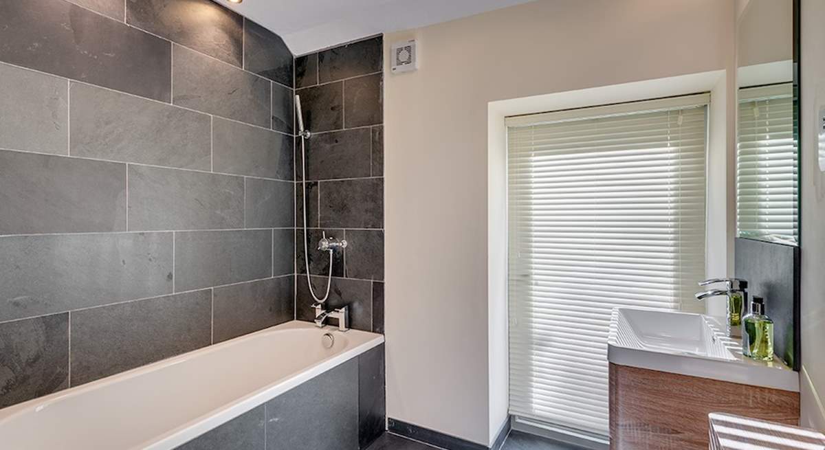 Light pours in to this gorgeous en suite bathroom (Bedroom 1).