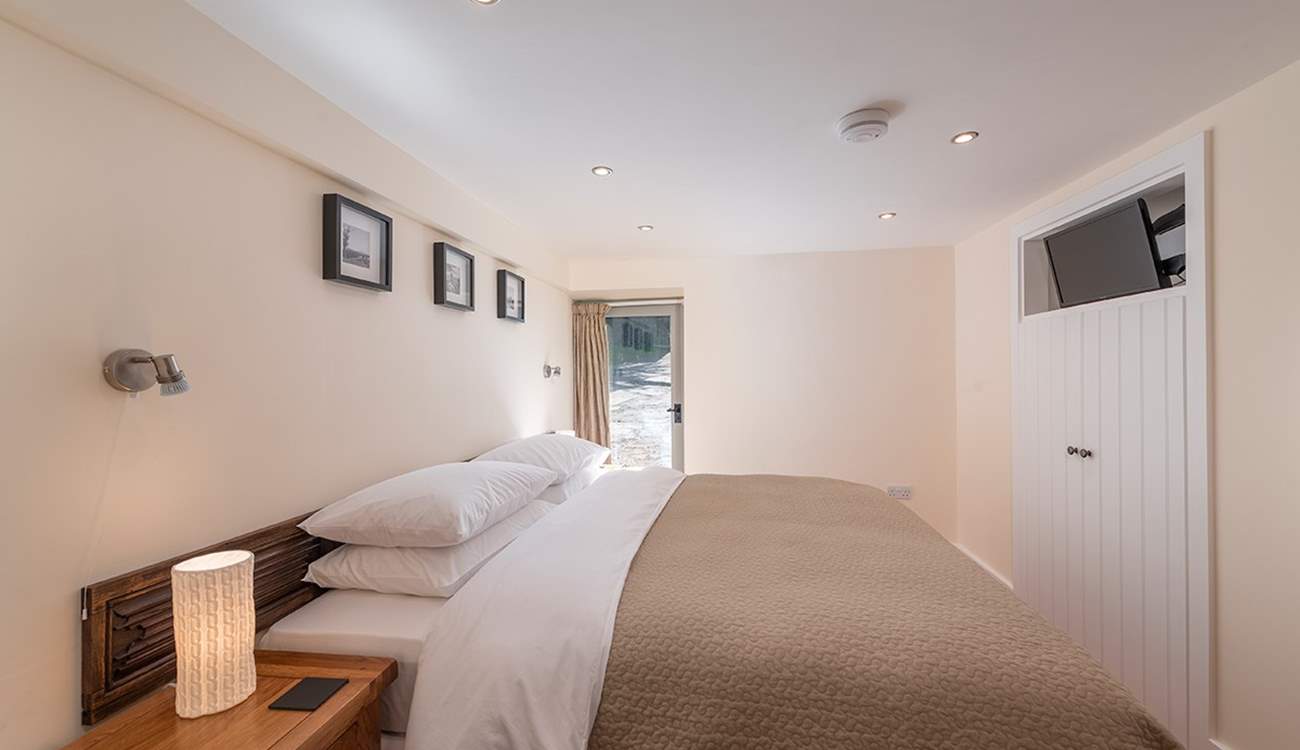 Bedroom 2 is equally as stunning as the rest of the house.