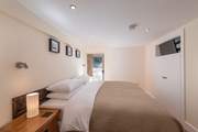 Bedroom 2 is equally as stunning as the rest of the house.