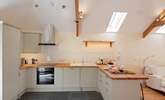 Spacious and well-equipped kitchen. Perfect for whipping up a feast. - Thumbnail Image