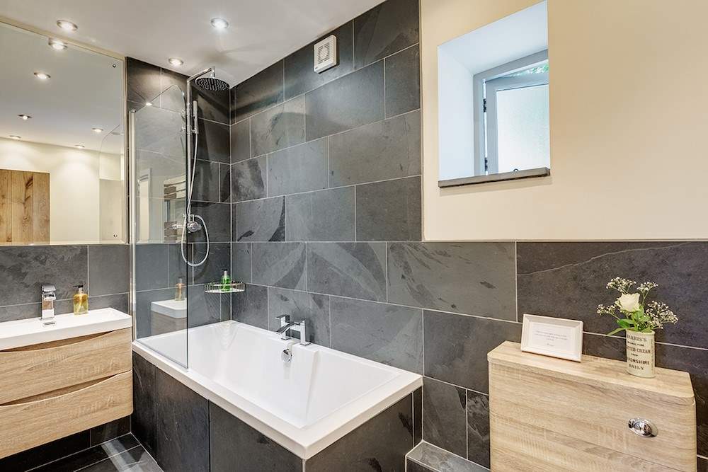 En suite bathroom to bedroom 1.