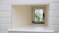A little window in the kitchen.