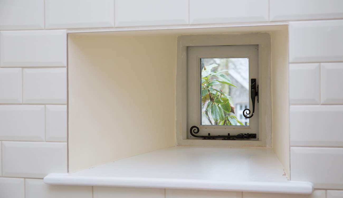 A little window in the kitchen.