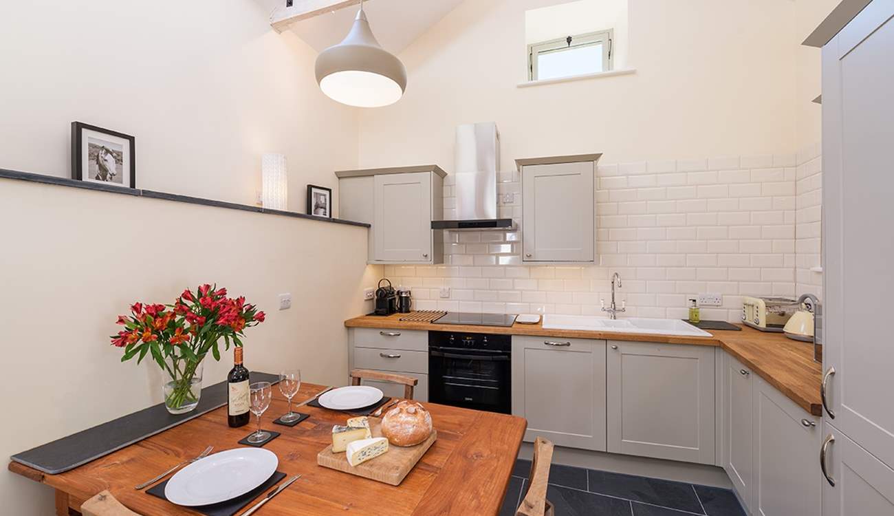 Open plan kitchen and dining area makes serving up a feast for two a real pleasure.