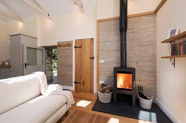 The glowing wood burner makes snuggling up and relaxing a real pleasure.