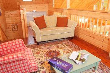 On the mezzanine level there is yet more cosy living space with a great supply of games and puzzles to keep children (and adults) occupied.