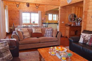 The open plan ground floor is filled with light and looks out over the veranda.