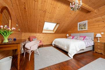 The main bedroom is on the first floor. It has a large en suite, high ceilings and so much space.