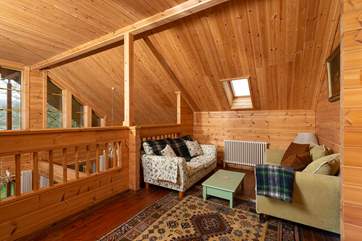 On the mezzanine level there is yet more cosy living space with a great supply of games and puzzles to keep children (and adults) occupied.