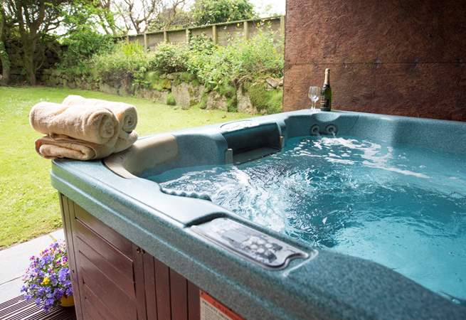 Enjoy the hot tub at Tremornah in your private enclosed garden.